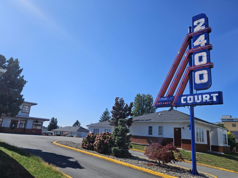 motel entrance with landmark neon sign vancouver