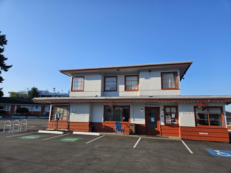 Motel exterior with convenient free parking at 2400 Motel