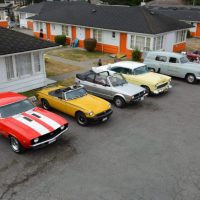 Lineup of classic vintage cars at 2400 Motel car show