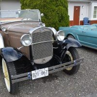 Retro car show and community event at 2400 Motel Kingsway